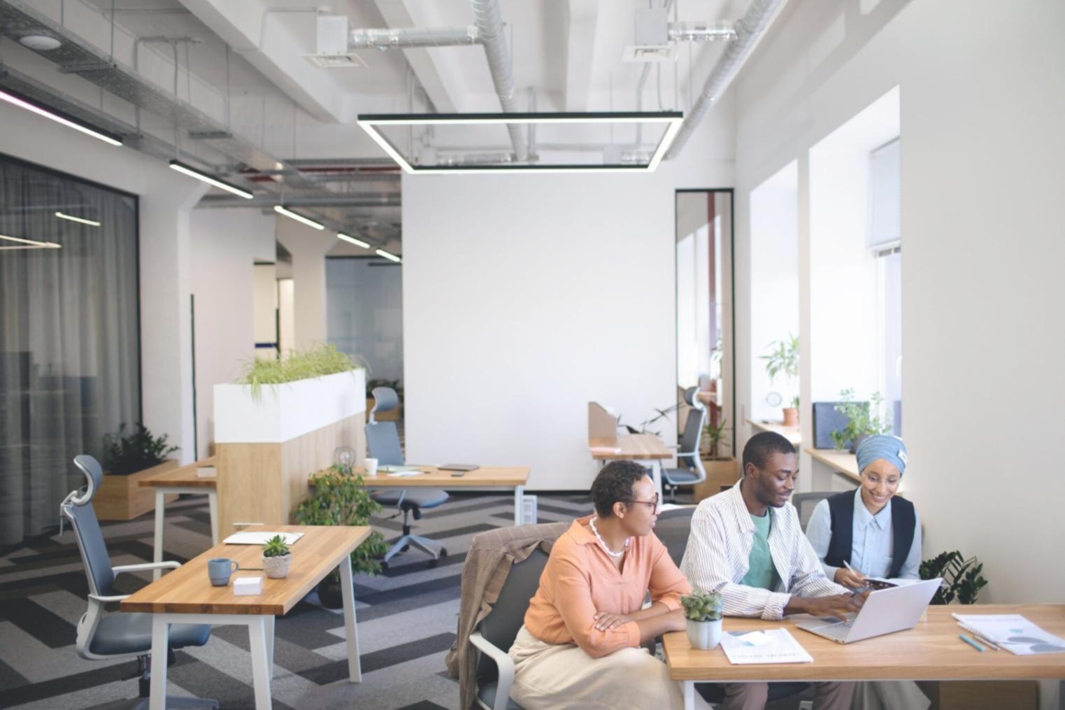 Professional analyzing financial data on multiple screens